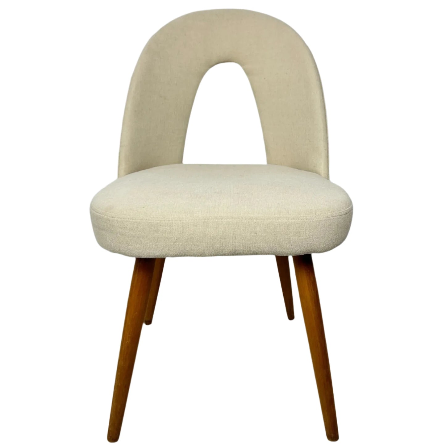 Beige upholstered chair with wooden legs