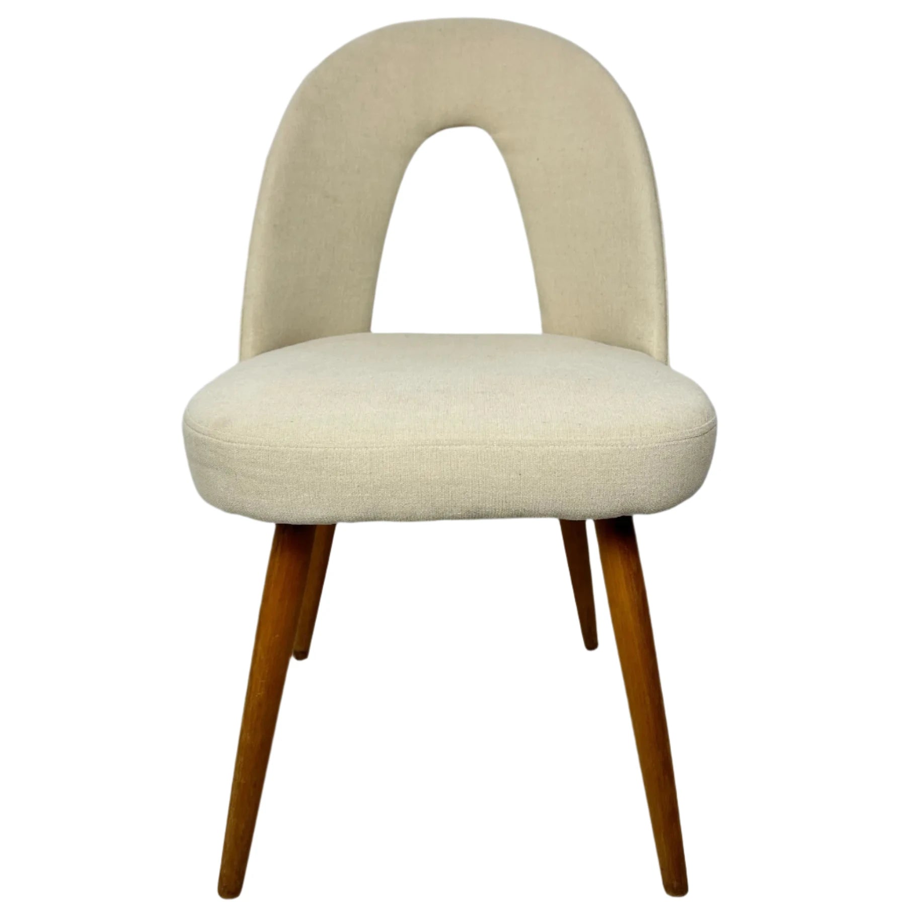 Beige upholstered chair with wooden legs