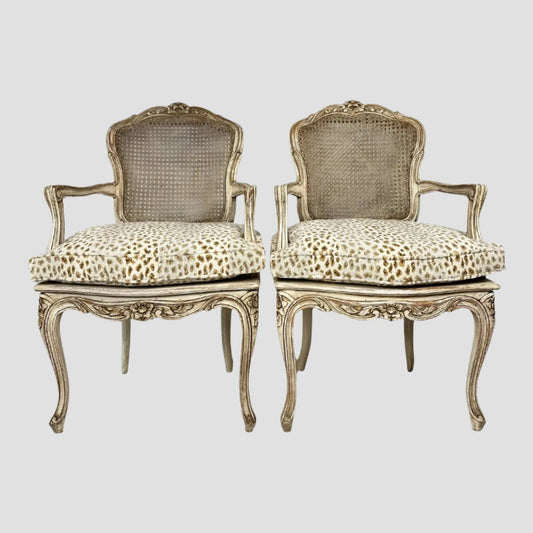 1980s Painted Frame Caned Back French Leopard Arm Chairs Pair