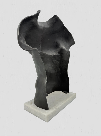 Black Metal Torso Sculpture on White Marble Base